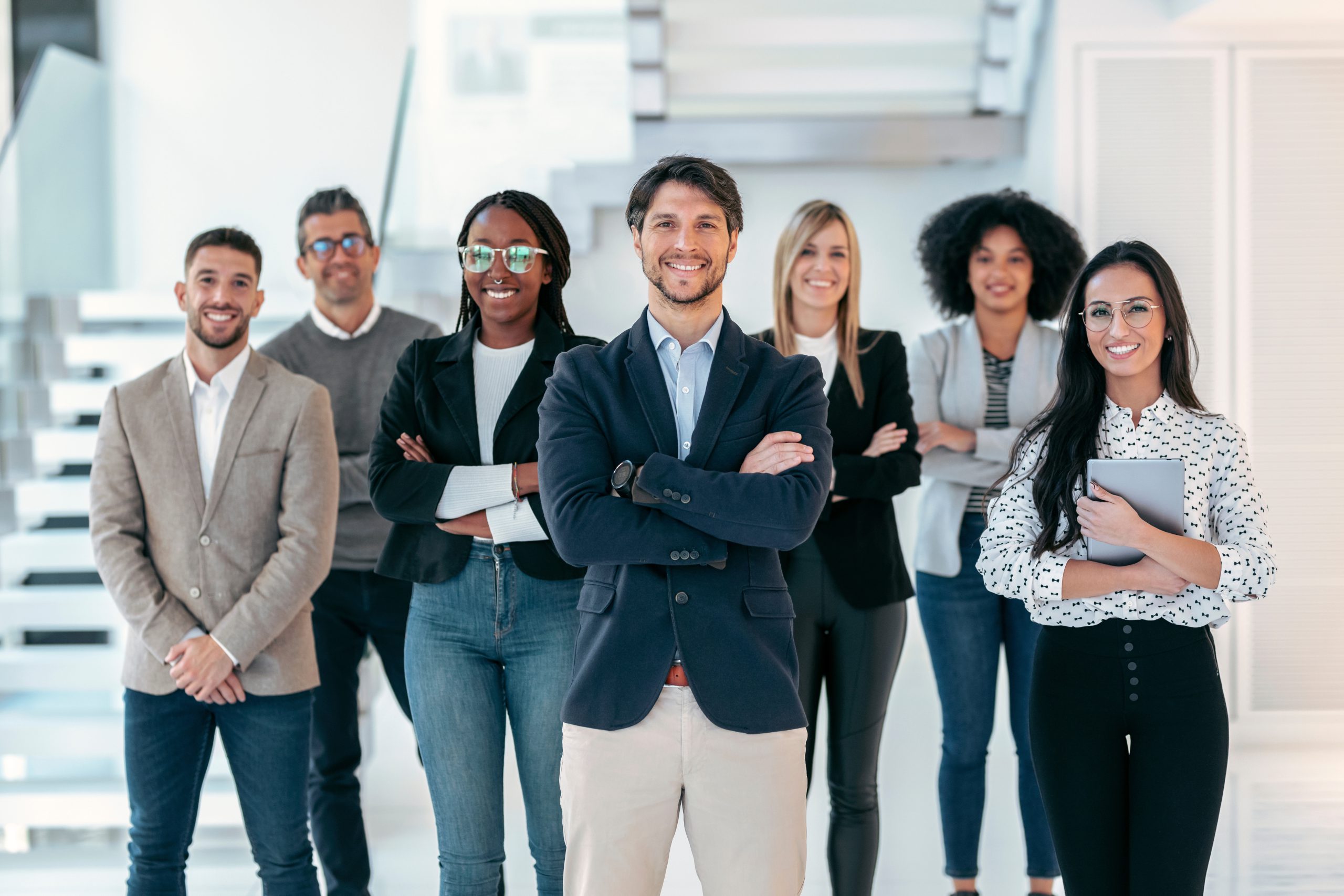 Shot,Of,Successful,Business,Multiage,Team,Posing,And,Looking,At